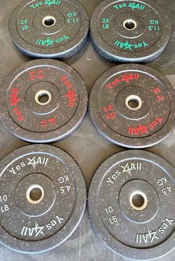 New set of 25 pound 15 pound and a 10 pound bumper weights