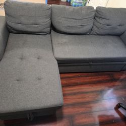 Reversable sofa with hide away bed. Firm not saggy.