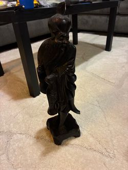 Hand carved Asian sculpture