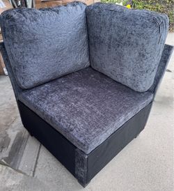Upholstered blue corner chair