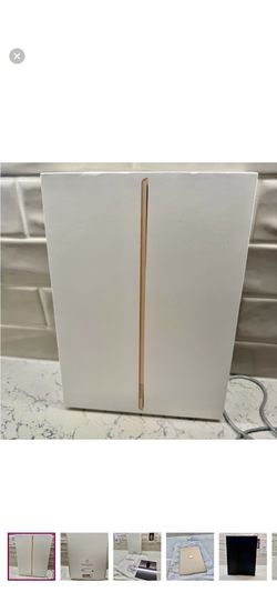 Apple 12.9” iPad Pro 128 GB (2nd Generation) Tablet in Gold comes with 2 cases.