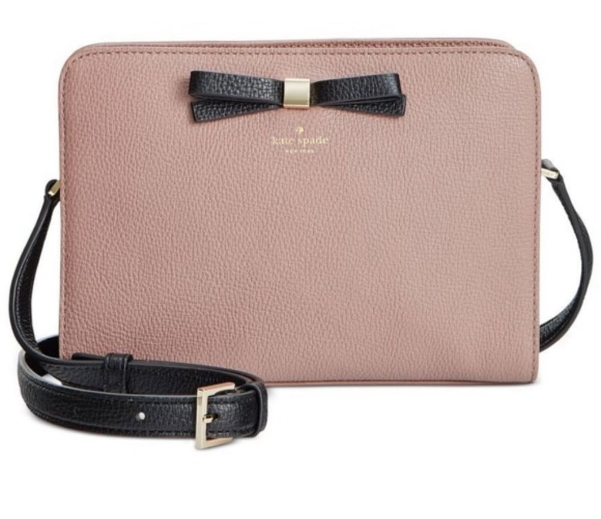Pink Kate Spade New York leather crossbody bag with gold hardware and black bow detail #preppy #crossbody