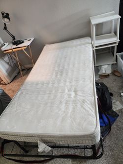 Twin bed with mattress