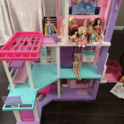 Barbie dream house with dolls