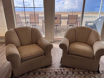 FREE! Two club swivel chairs