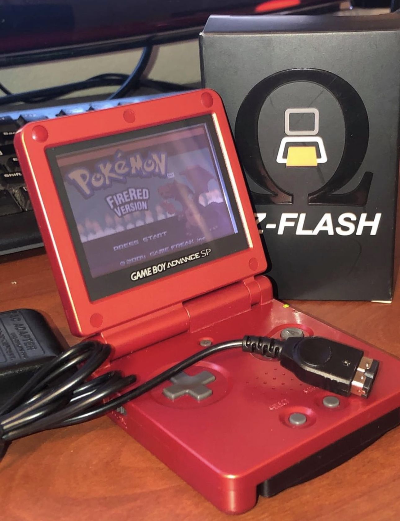 Game Boy Advance SP (Crimson) + EZ-Flash Omega + Charger