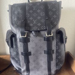 Louis Vuitton Book Bag / Cartier De Santos watch