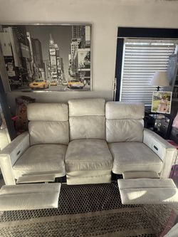 White leather motor couch recliner