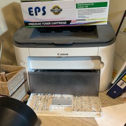 Small canon, black and white printer with brand new cartridge