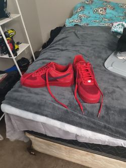 Nike Air Force 1 Red Low-Top Sneakers