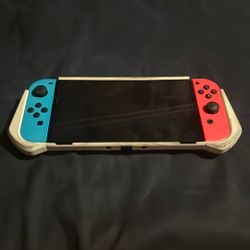 Nintendo Switch Oled Color + Grip
