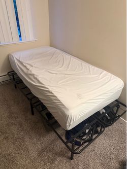 Bed + Frame (Includes mattress topper)