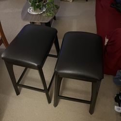 Set of 2 Black Barstools with Cushioned Seats

$12 each