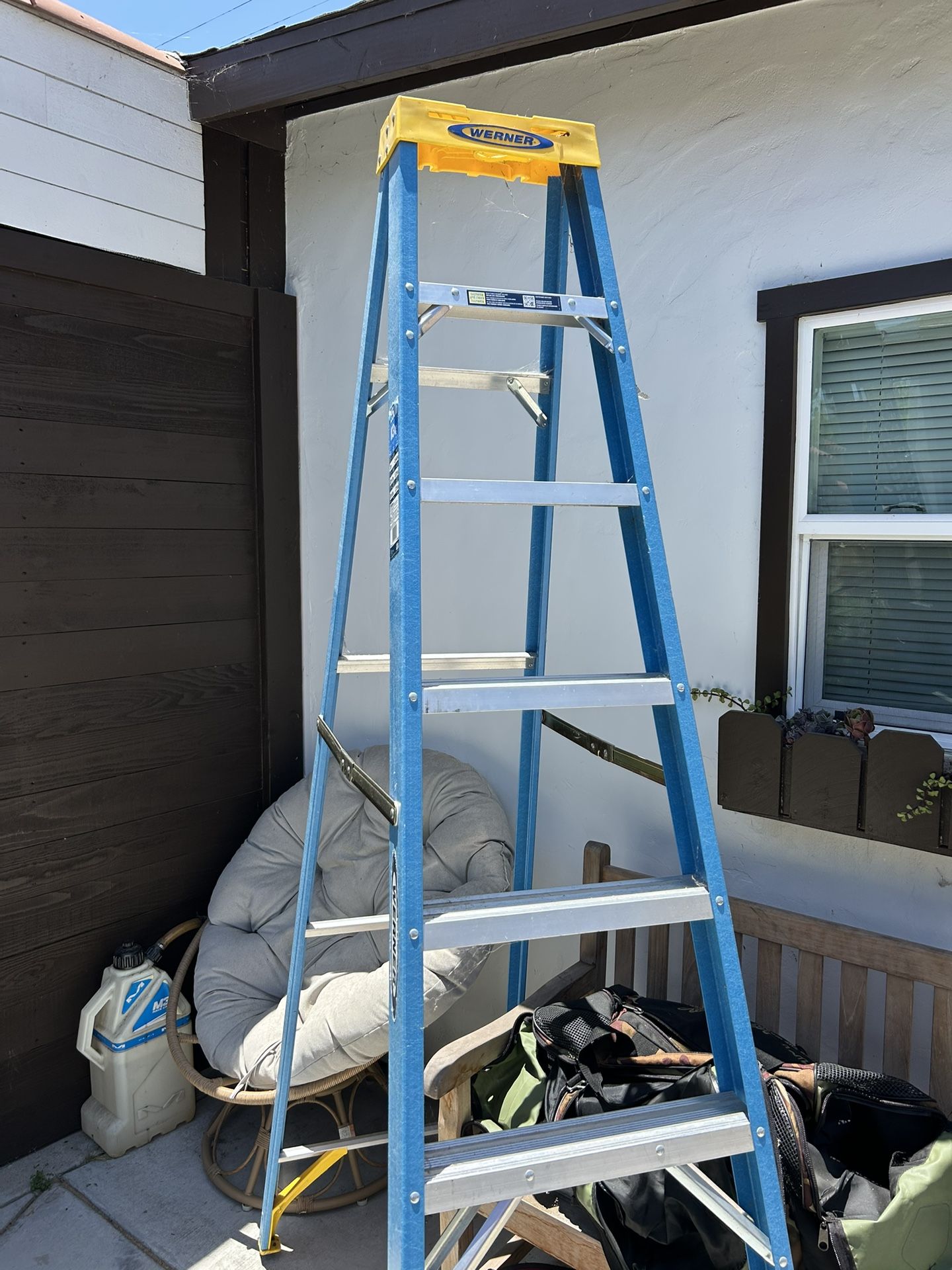 Warner 8 foot fiberglass ladder used two times excellent condition