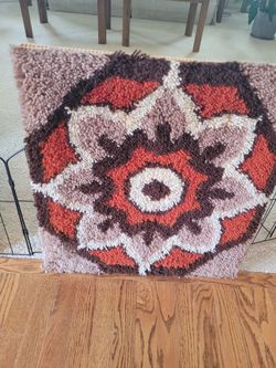 Hook rug wall art