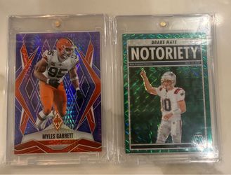 The 2025 Panini Phoenix trading card featuring Myles Garrett #73 is a sought-after collectible for football fans. This card is a Purple Hyper parallel