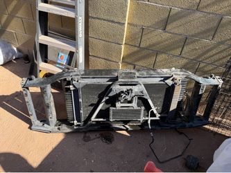 05 Yukon radiator support