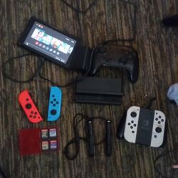Nintendo Switch OLED Plus 4 Games An Extra Set Of Controllers Plus more 