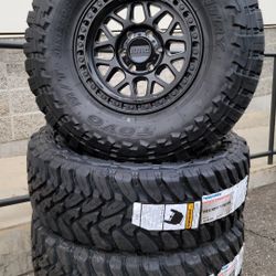 17" KMC rims w/ 35x12.50R17 Toyo MT Open Country