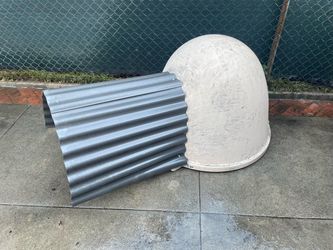 Dogloo dog house with added protection from rain