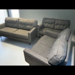 Ashley® Zardoni Charcoal 3 pieces Charcoal living room sets. 