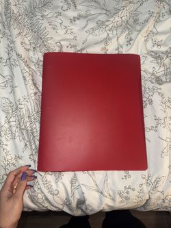 Red Binder with Pokémon cards