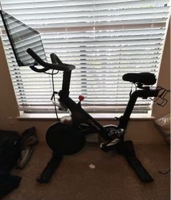 Peleton Bike + size 12 shoes (delivery included)
