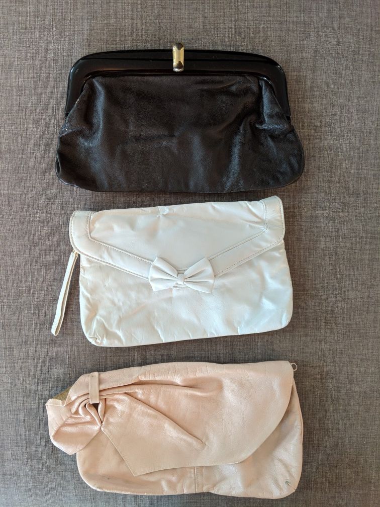 Three vintage clutch purses