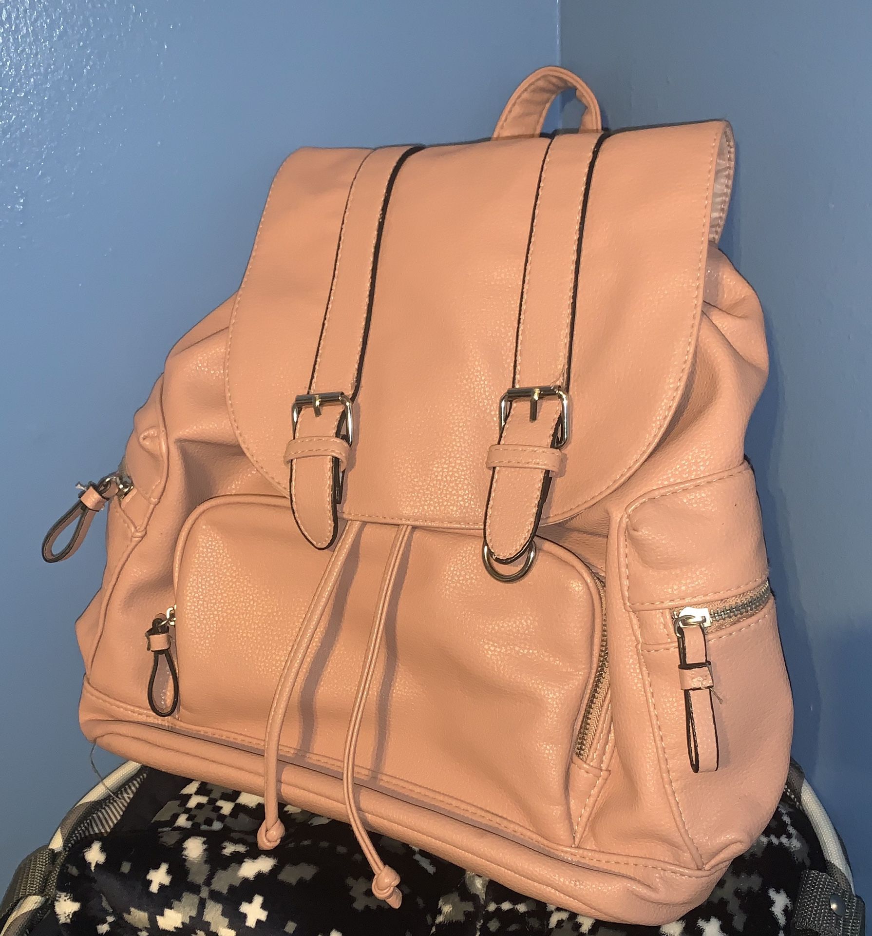 Pink backpack.