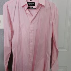 Mens dkny suit. Includes pants 30W 30L, jacket 38R, pink button up long sleeve size small. Smoke free house. Worn one time. 