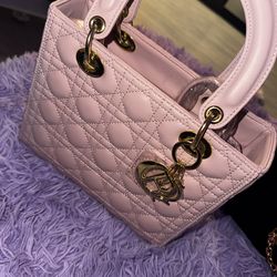 Dior pink and gold purse