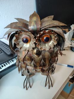 Brutalist art movement metal owls