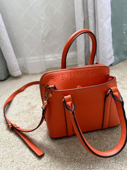 Steve Madden Orange cross body purse.