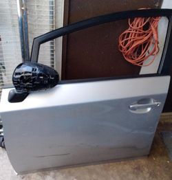 Silver third-generation Toyota Prius (2010–2015) front left (driver side) door assembly used
