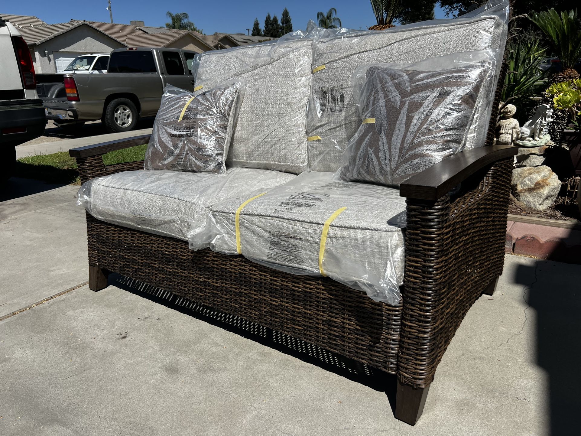 Brand New. Ashley Furniture Patio Loveseat. $349