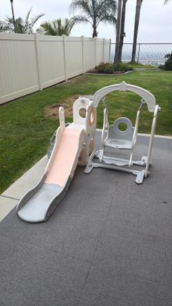 Toddler swing, slide and basketball hoop