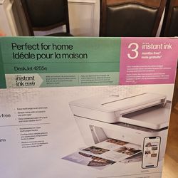 Brand new Hp 4255e  printer and ink cartridge.