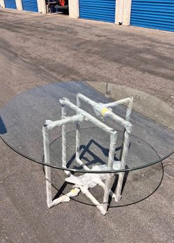 Brand new 48” round glass dining table