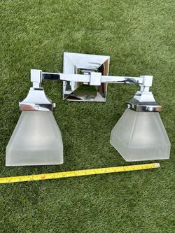Wall lamp with two spotlights only one