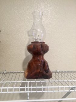 Wooden hand carved oil lamp