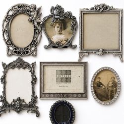 Set of 24 vintage ornate silver-toned Victorian-style metal photo frames