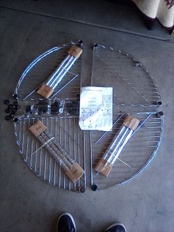 Tier fan shaped corner rack