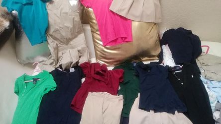 Girl 7/8 uniforms 3 pants,2jumpers,1short,2sorts,6 shirts 2 polo dresses