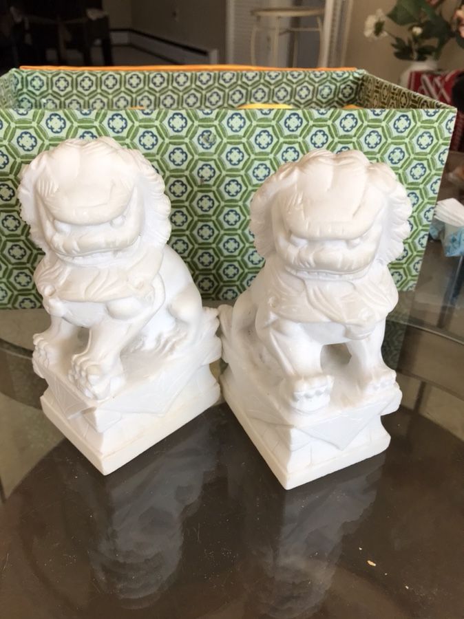 Chinese lions carved in white marble