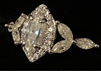 Size 7 <0.5 carat Marquise ring with side stones