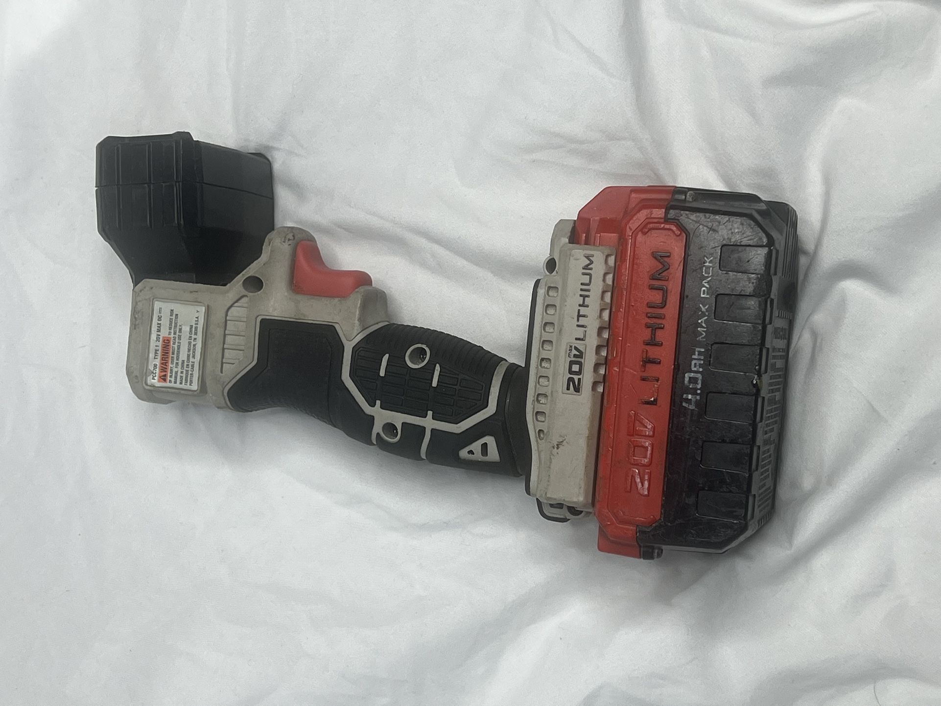 Porter-Cable 20V MAX LED flashlight with a 4.0Ah battery pack. 