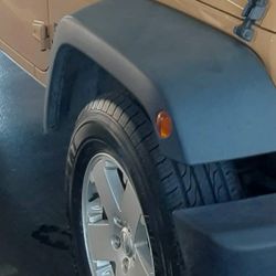 Best offer? 4 Jeep wheels and tires 