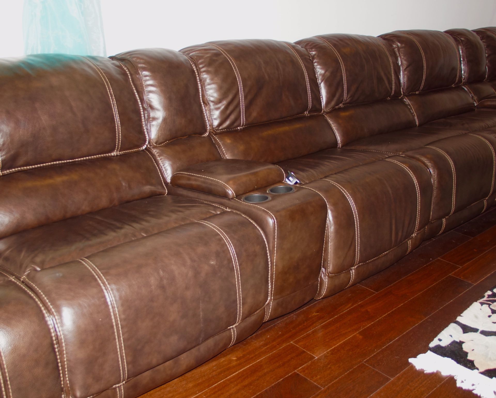 Fine Brown Leather Couch, All 4 pieces are recliners.