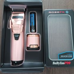 Brand new babyliss clippers Rose Gold wireless comes with the battery charger stand and all guards 200.00