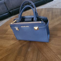 Michael Kors Karla EW (East West) Satchel, crafted from navy blue Saffiano leather.